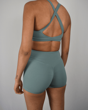 short deportivo verde claro euforia back min